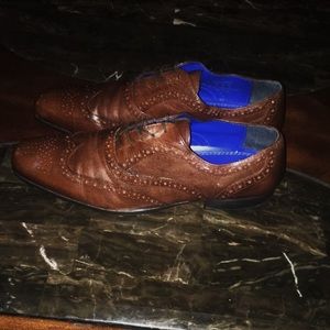 Red tape etched brogues in brown leather